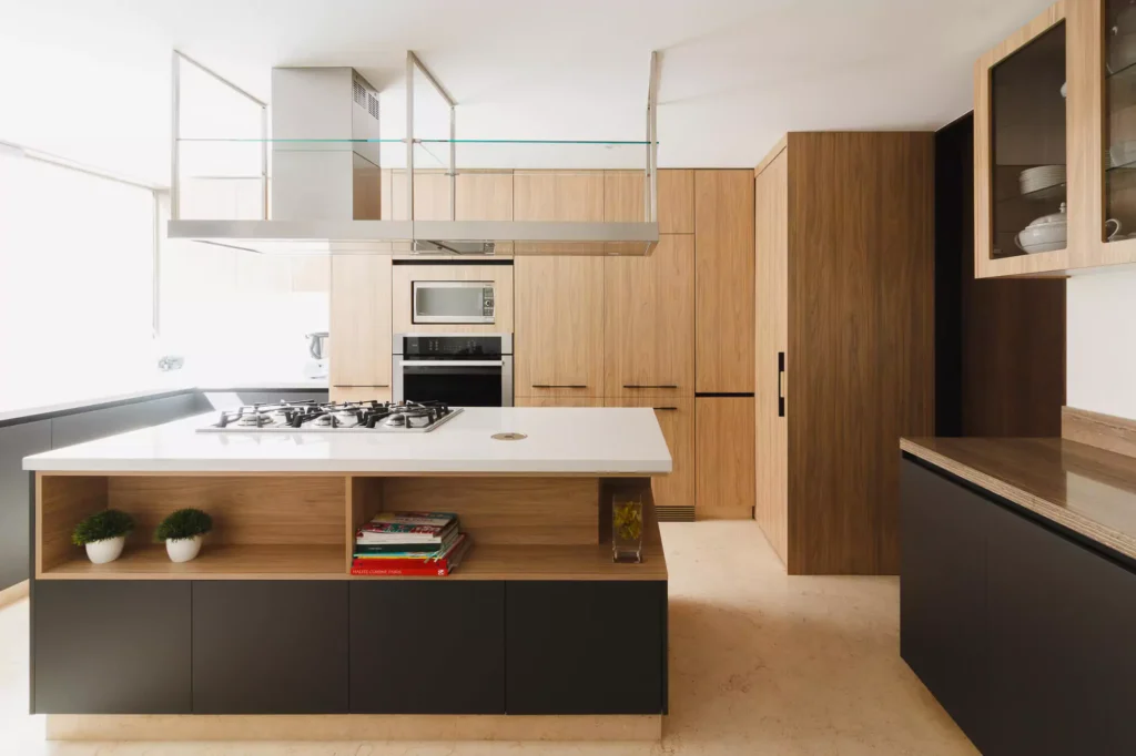 Wooden modular kitchen with central island designed by Vitelier in Coyoacán, Mexico City.