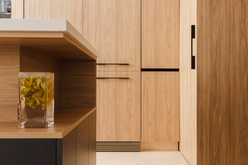 Wooden modular kitchen with central island designed by Vitelier in Coyoacán, Mexico City.