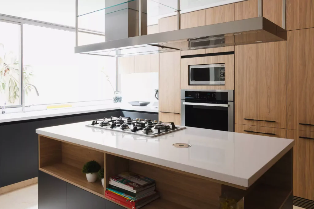 Wooden modular kitchen with central island designed by Vitelier in Coyoacán, Mexico City.