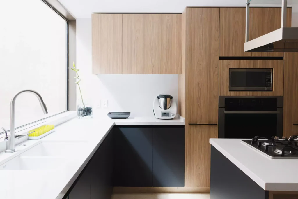 Wooden modular kitchen with central island designed by Vitelier in Coyoacán, Mexico City.