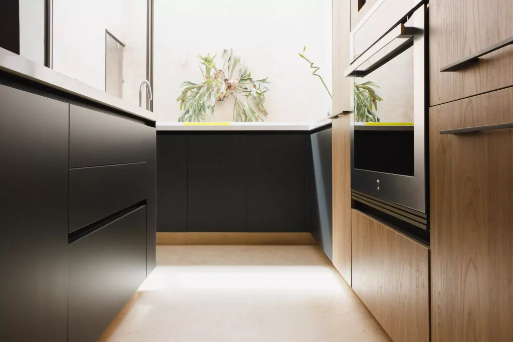 Wooden modular kitchen with central island designed by Vitelier in Coyoacán, Mexico City.