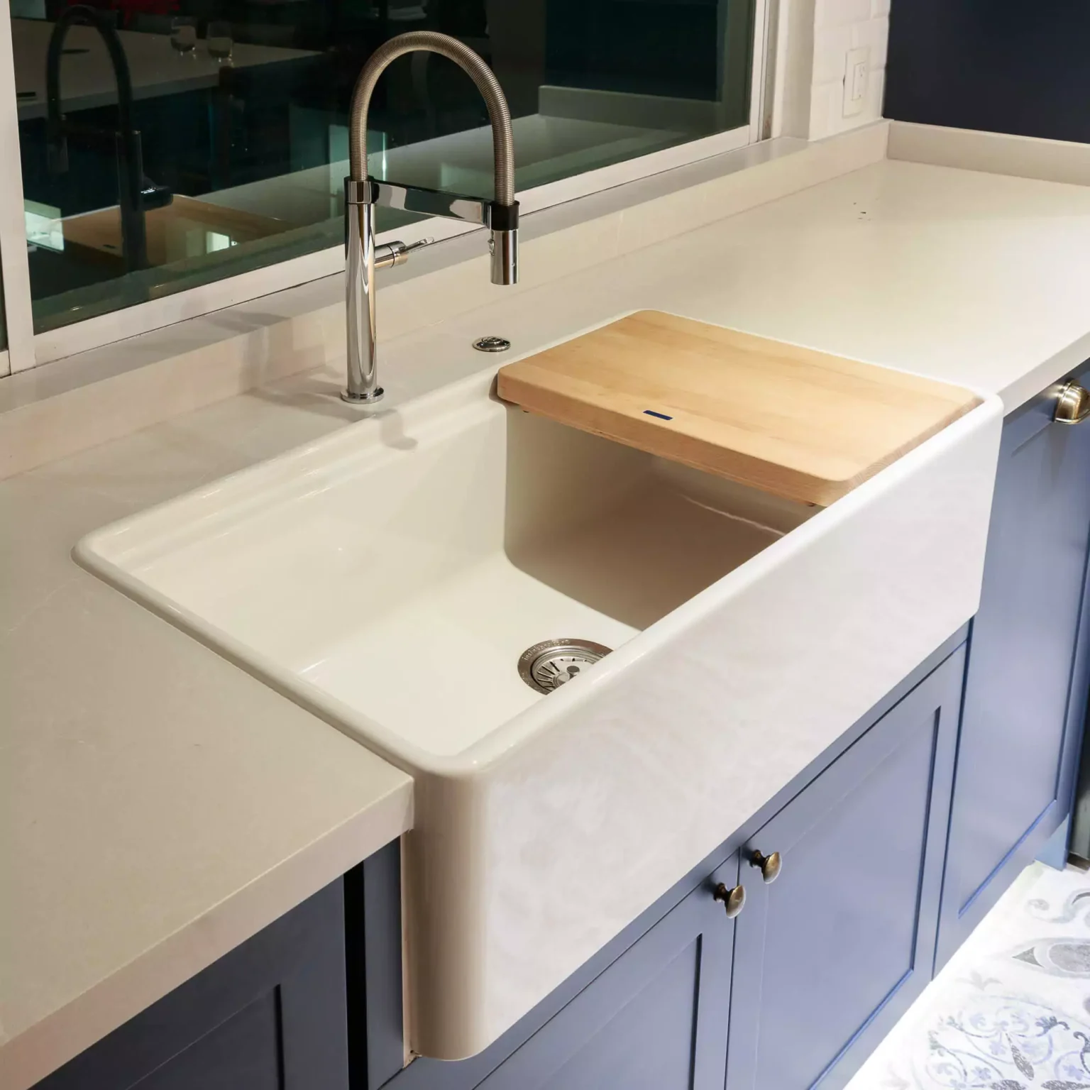 Classic-style navy blue lacquered kitchen designed by Vitelier at La Isla in Colonia Santa Fe, Mexico City.