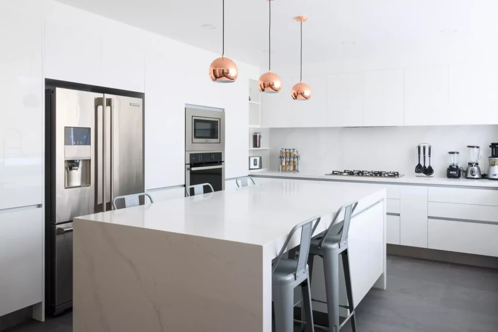 Minimalist modern kitchen with central island designed by Vitelier at G11, Colonia Bosques de las Lomas, Mexico City.