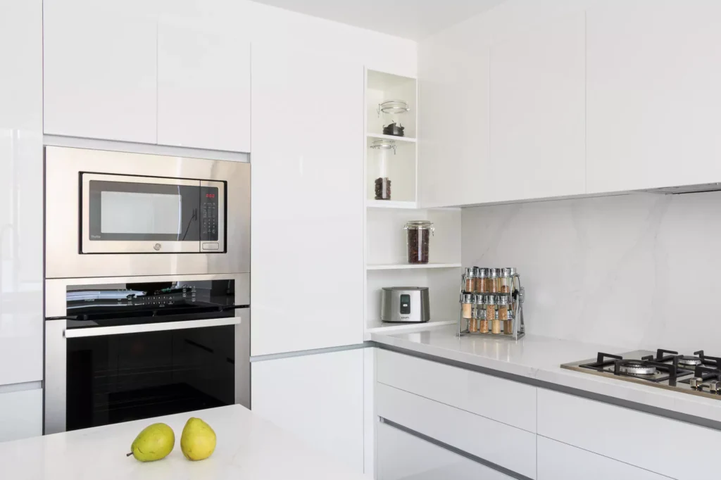 Minimalist modern kitchen with central island designed by Vitelier at G11, Colonia Bosques de las Lomas, Mexico City.