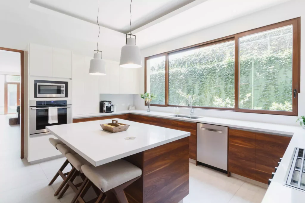 Modern kitchen with central island designed by Vitelier at Santa Anita in Colonia Lomas Hipódromo, Mexico City.