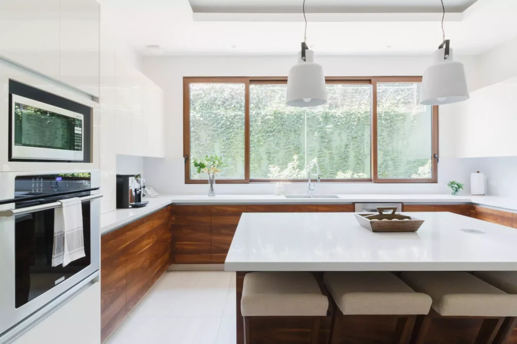 Modern kitchen with central island designed by Vitelier at Santa Anita, Colonia Lomas Hipódromo, Mexico City.