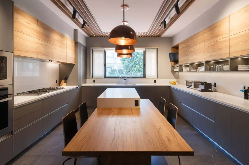 Modern L-shaped wooden kitchen designed by Vitelier at Las Villas, Colonia Lomas de Chapultepec, Mexico City.