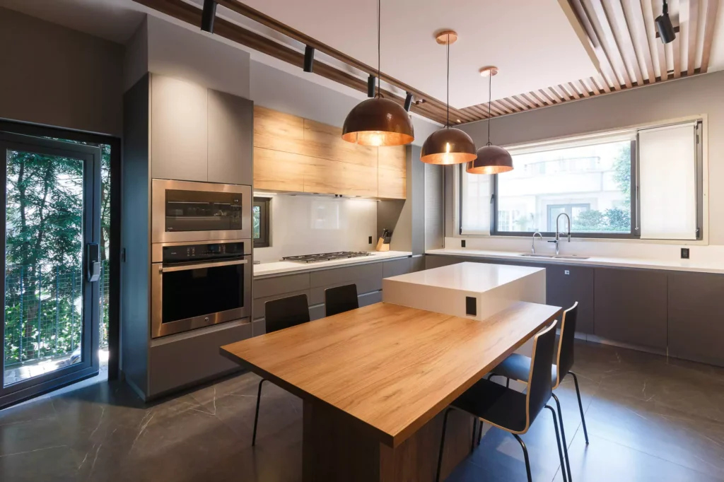 Modern L-shaped wooden kitchen designed by Vitelier at Las Villas, Colonia Lomas de Chapultepec, Mexico City.