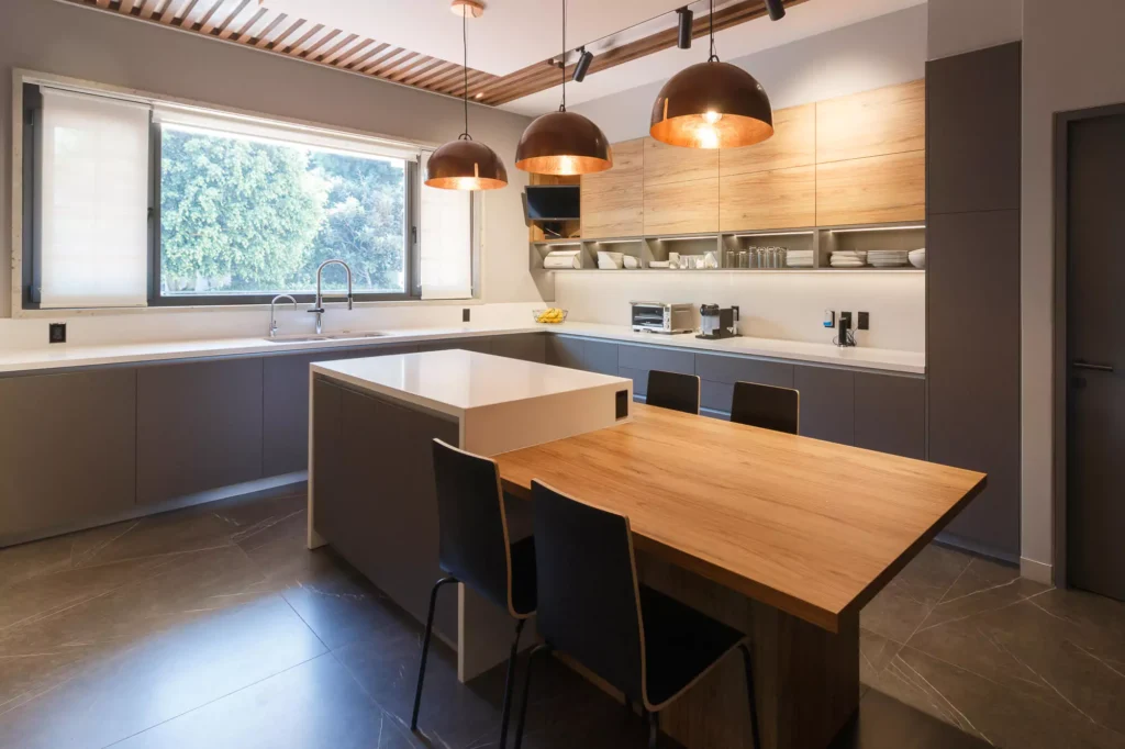 Modern L-shaped wooden kitchen designed by Vitelier at Las Villas, Colonia Lomas de Chapultepec, Mexico City.