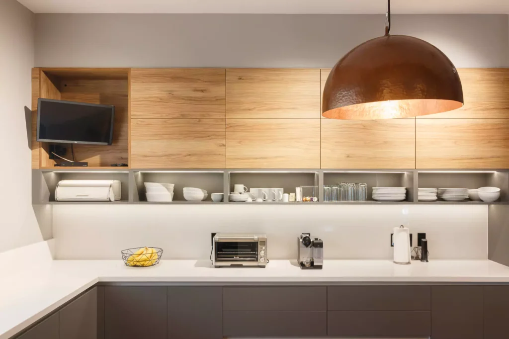 Modern L-shaped wooden kitchen designed by Vitelier at Las Villas, Colonia Lomas de Chapultepec, Mexico City.