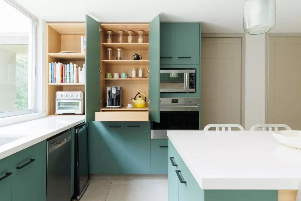 Sage green lacquered kitchen designed by Vitelier at Versalles in Lomas de Reforma, Mexico City.