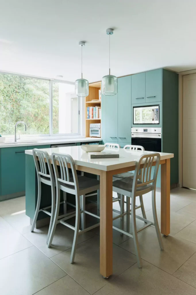 Sage green lacquered kitchen designed by Vitelier at Versalles in Lomas de Reforma, Mexico City.