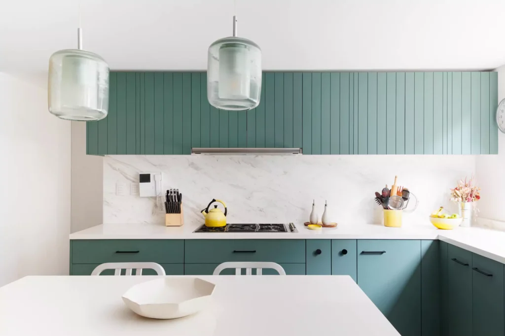 Sage green lacquered kitchen designed by Vitelier at Versalles in Lomas de Reforma, Mexico City.