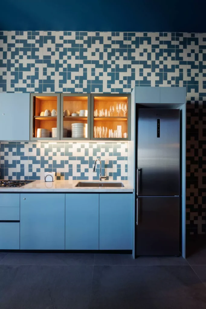 Custom blue kitchen designed by Vitelier at Edificio Amalia in Colonia Nápoles, Mexico City.