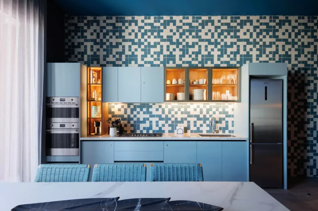 Custom blue kitchen designed by Vitelier at Edificio Amalia in Colonia Nápoles, Mexico City.