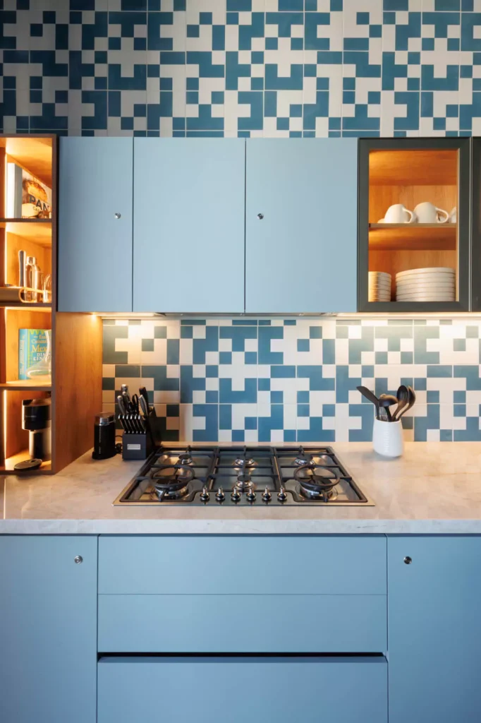Custom blue kitchen designed by Vitelier at Edificio Amalia in Colonia Nápoles, Mexico City.