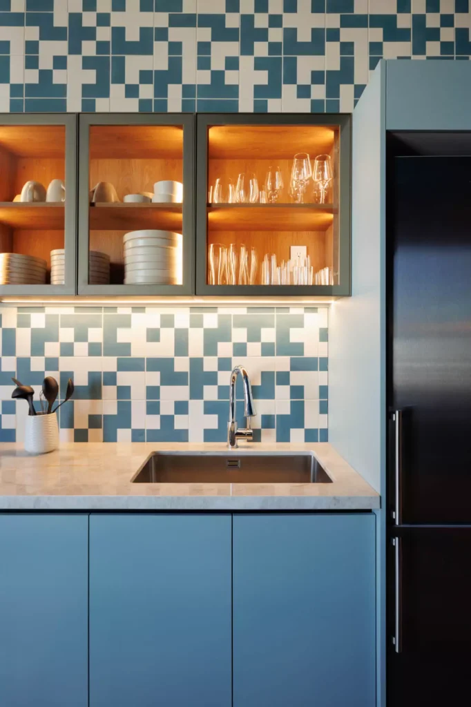 Custom blue kitchen designed by Vitelier at Edificio Amalia in Colonia Nápoles, Mexico City.