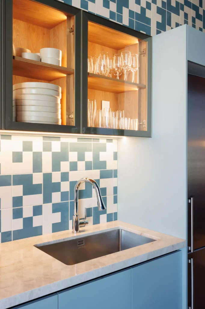 Custom blue kitchen designed by Vitelier at Edificio Amalia in Colonia Nápoles, Mexico City.
