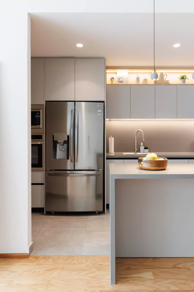Small gray modular kitchen designed by Vitelier at Neuchatel in Colonia Polanco, Mexico City.